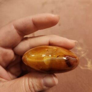 Carnelian heart with orca agate inclusions